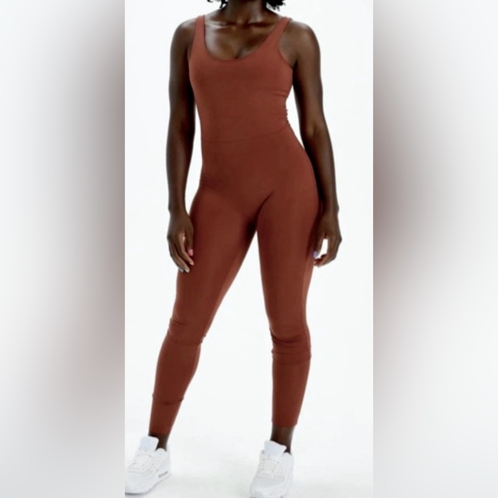 Girlfriend Collective Scoop Neck Jumpsuit Skinny Legs in Rust Color Size S